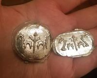 Pewter casted tokens. 2018